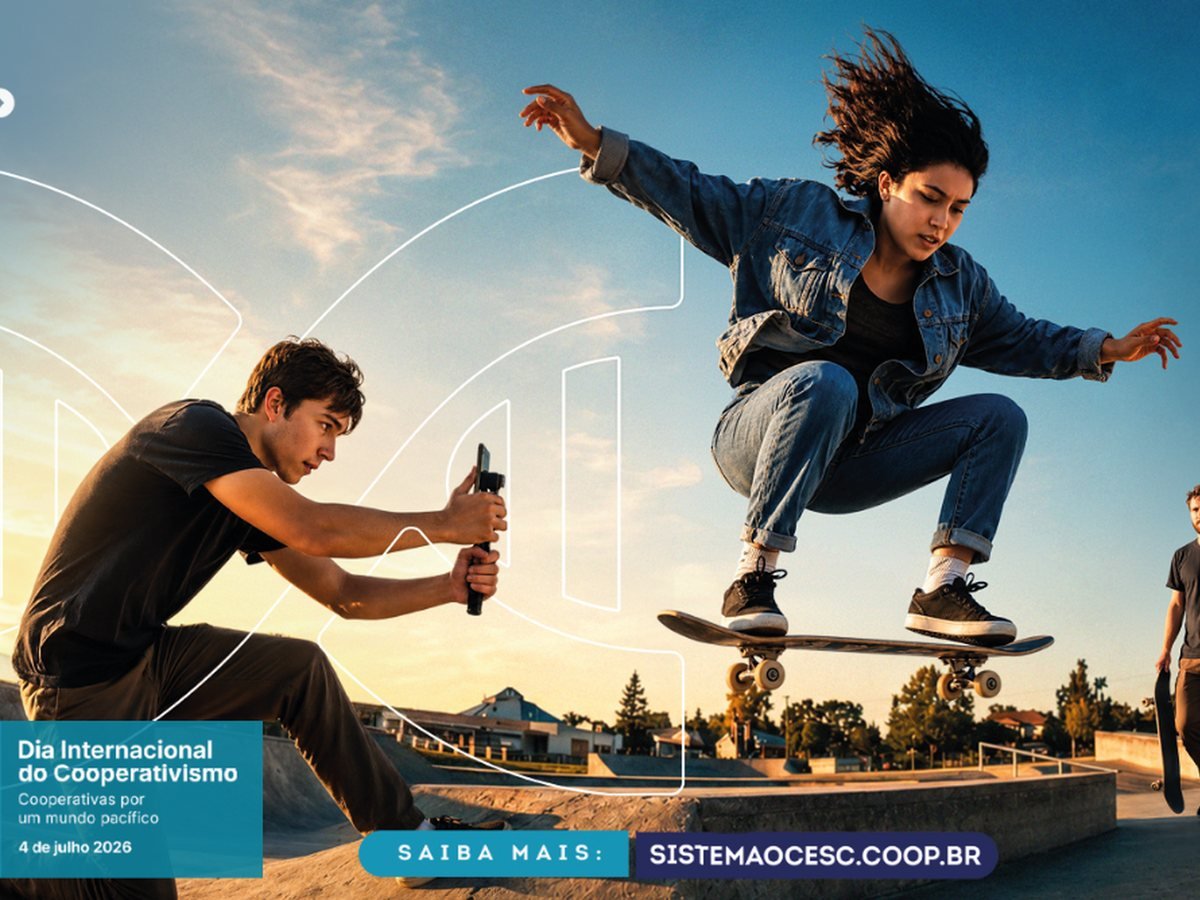 Peça da campanha: jovem fazendo uma manobra de skate enquanto um amigo grava com o celular, com a assinatura do Dia Internacional do Cooperativismo.